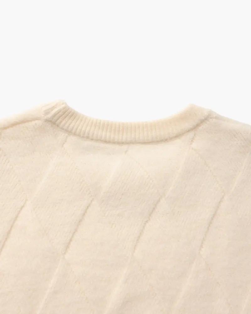 Pull à col rond en tricot diamanté