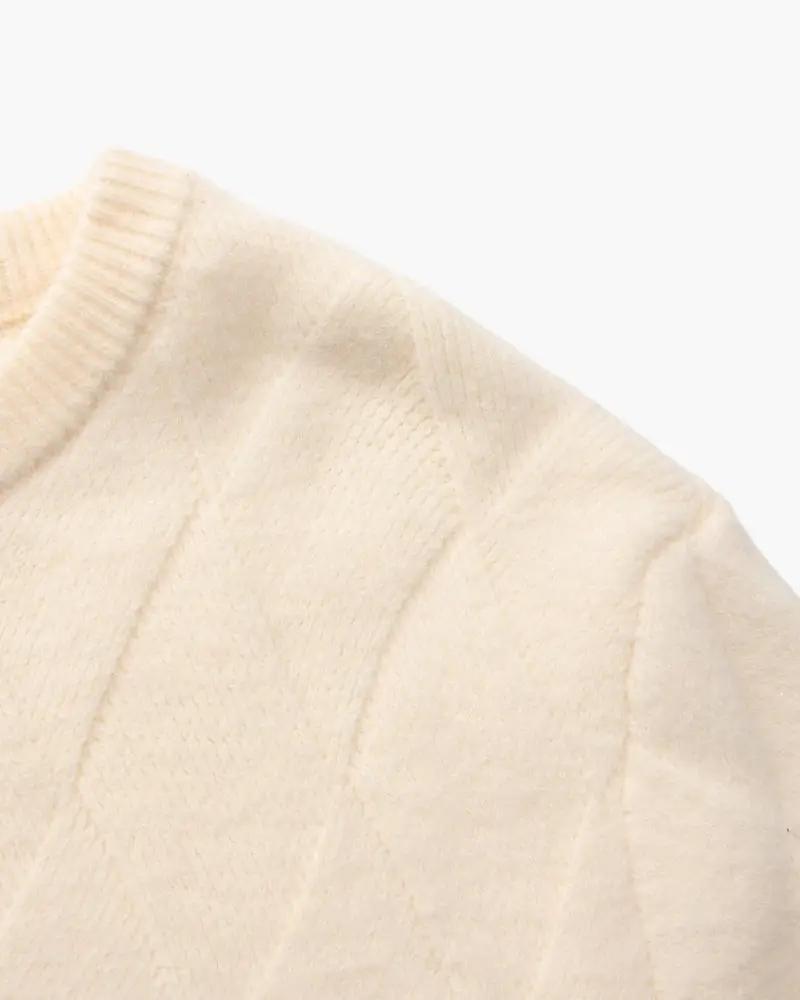 Pull à col rond en tricot diamanté