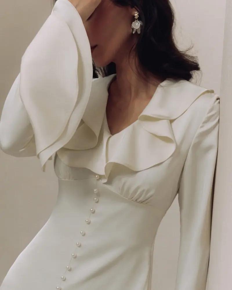 Robe midi à volants et boutons nacrés