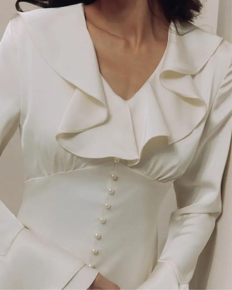 Robe midi à volants et boutons nacrés