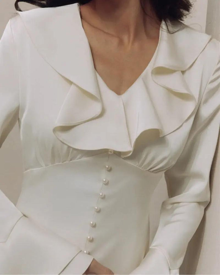 Robe midi à volants et boutons nacrés