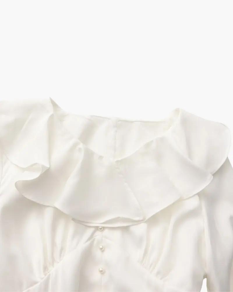 Robe midi à volants et boutons nacrés