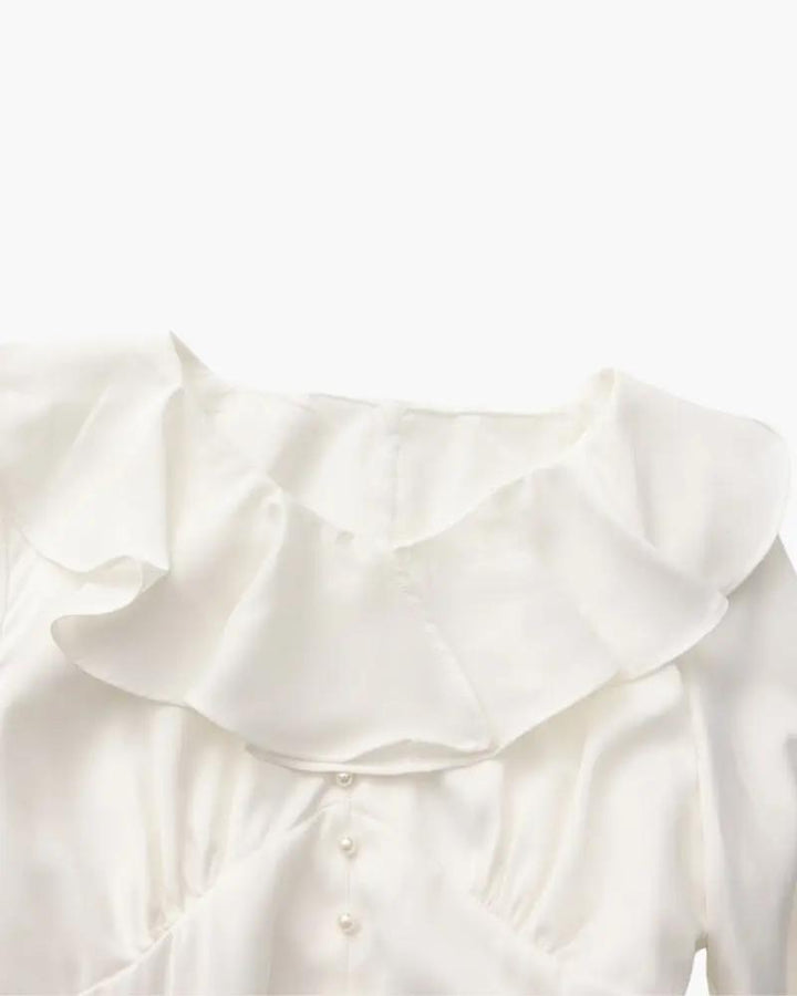 Robe midi à volants et boutons nacrés