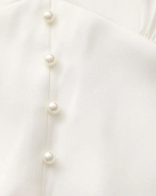 Robe midi à volants et boutons nacrés